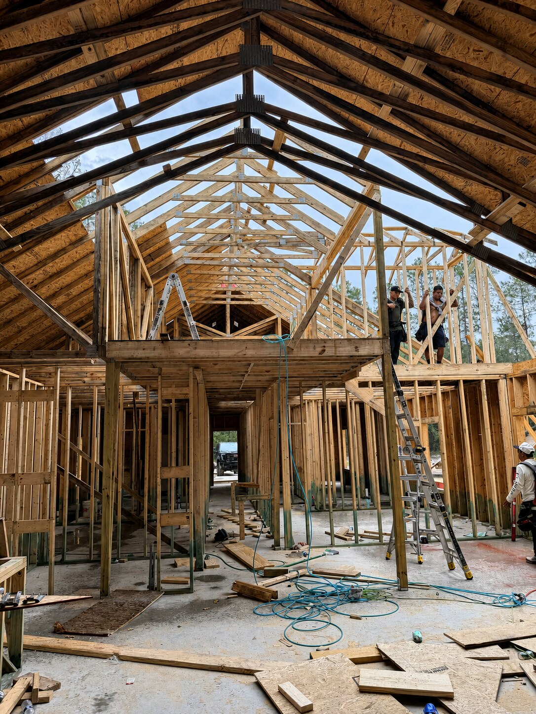 Crew framing a loft and dormer inside a custom home in Flagler Estates Florida