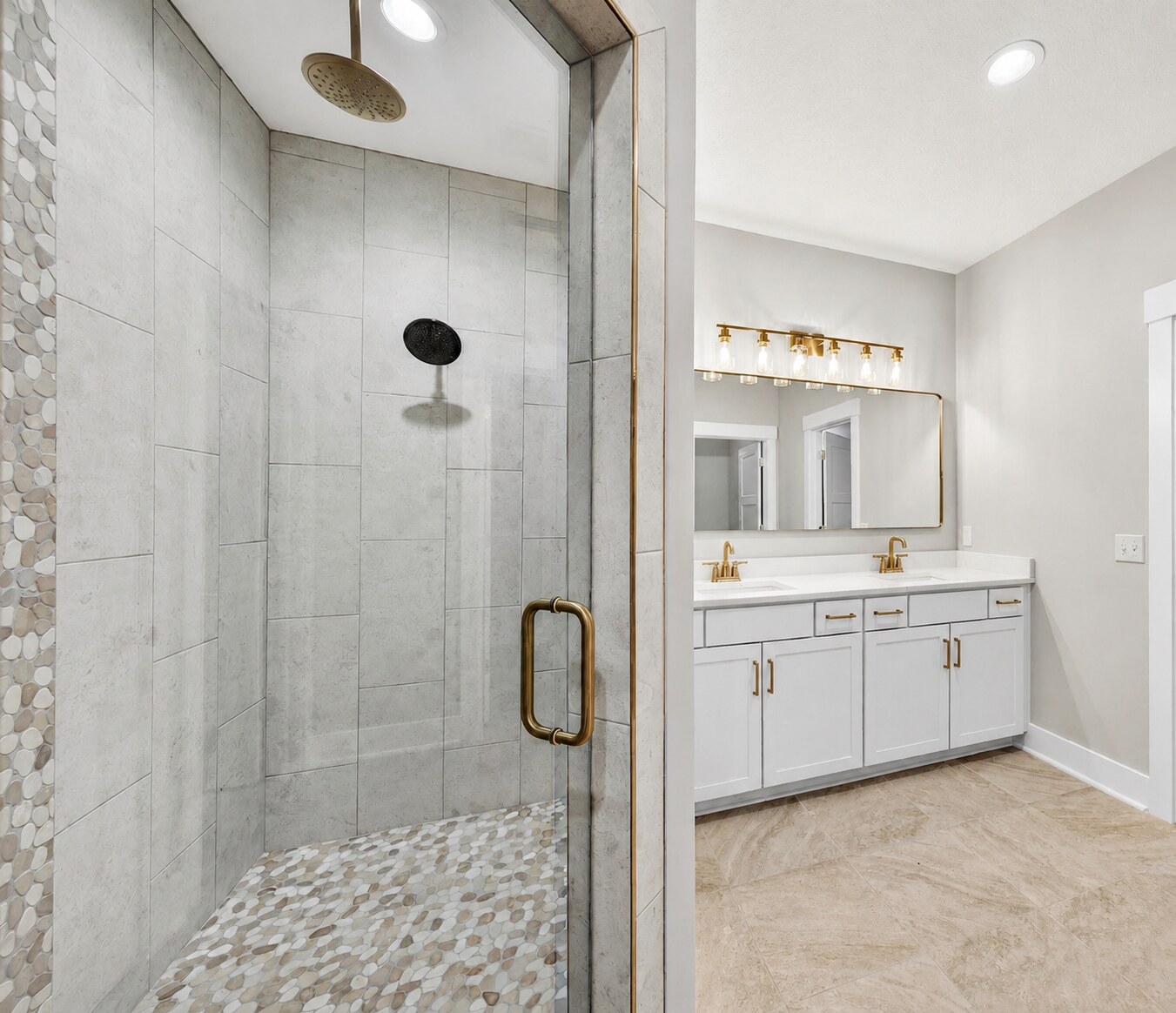 Completed St. Augustine bathroom remodel with glass shower and double vanity